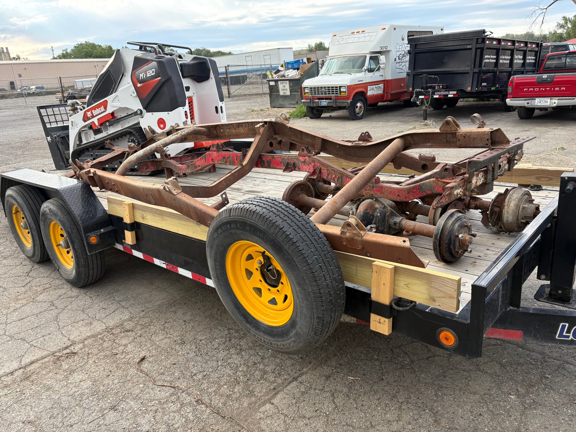 Old Vehicle Frames and Axles Cleared Out in Laurel image