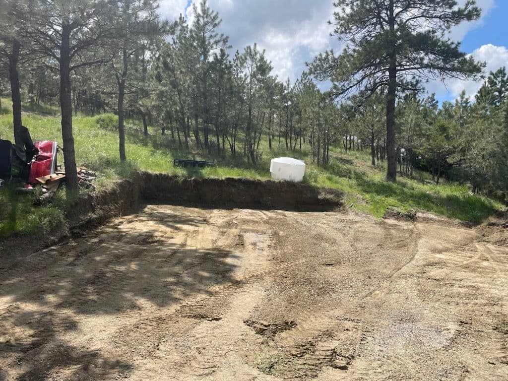 Project Expert Dirt and Debris Clearing in Forest Setting image