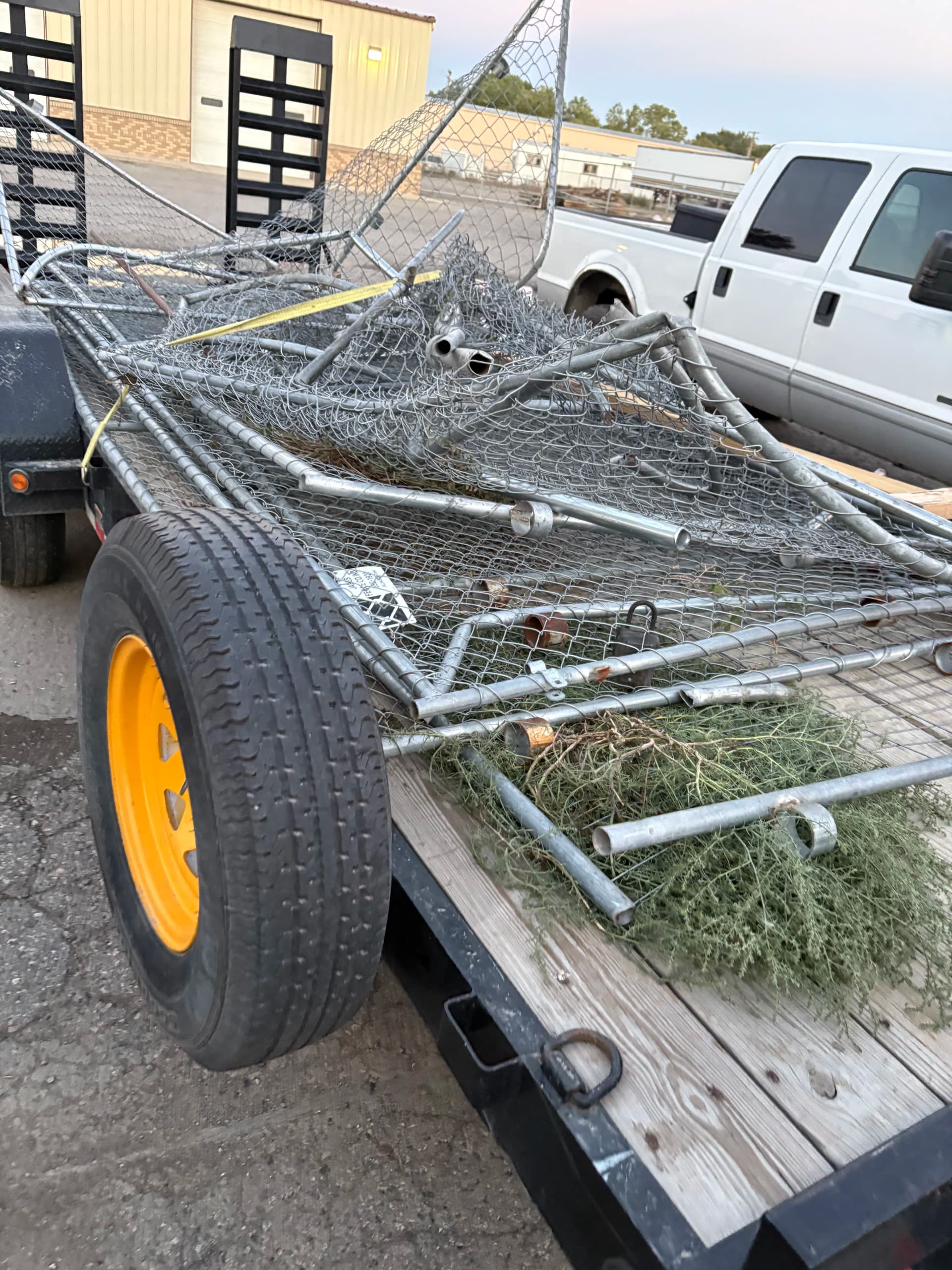 Bent-Up Chain Link Fence Hauled Away Fast image